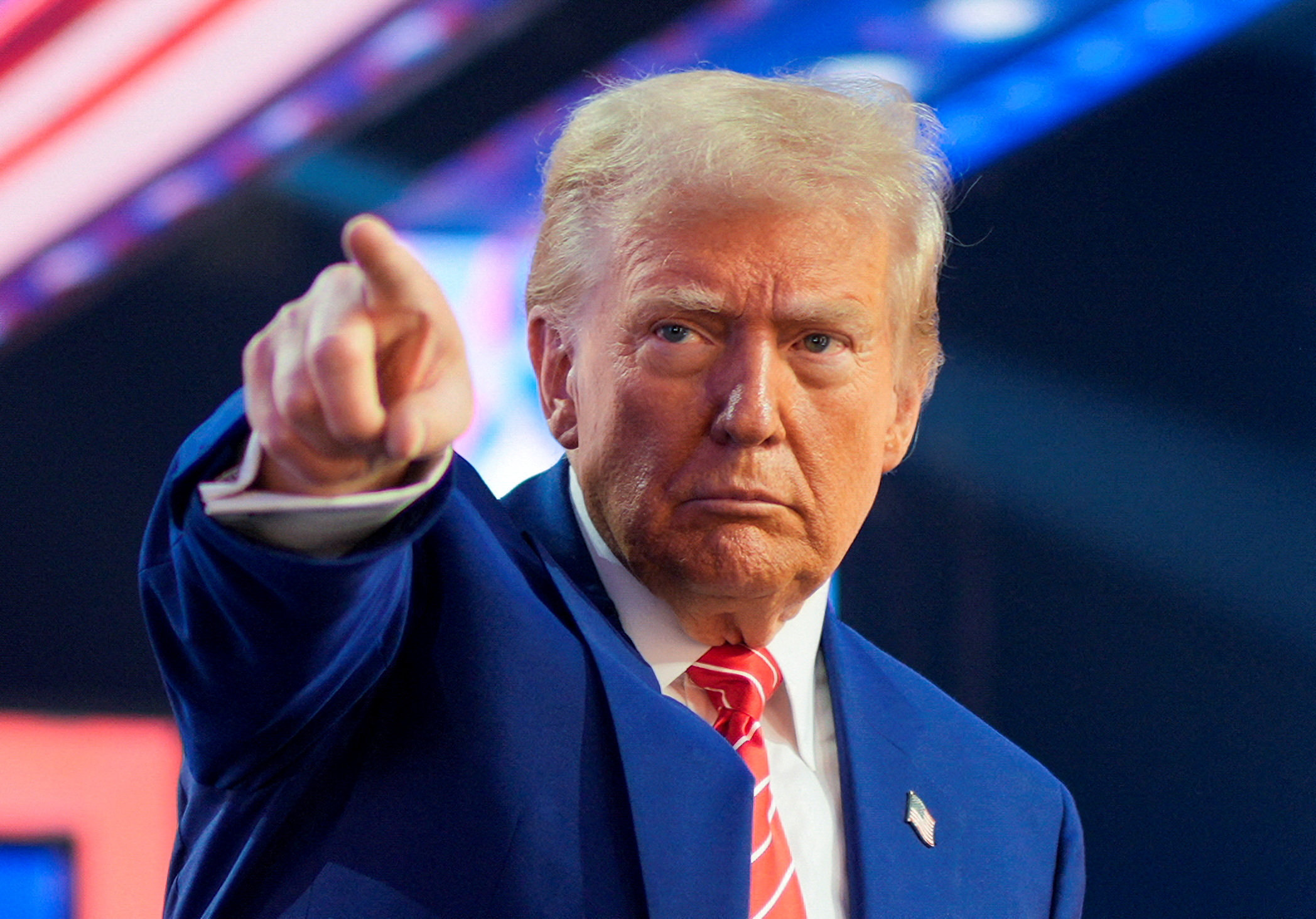 FILE PHOTO: U.S. President-elect Donald Trump gestures at Turning Point USA's AmericaFest in Phoenix, Arizona, U.S., December 22, 2024.  REUTERS/Cheney Orr/File Photo